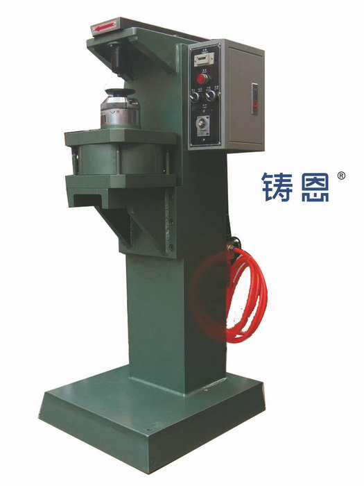 Pneumatic riveting machine